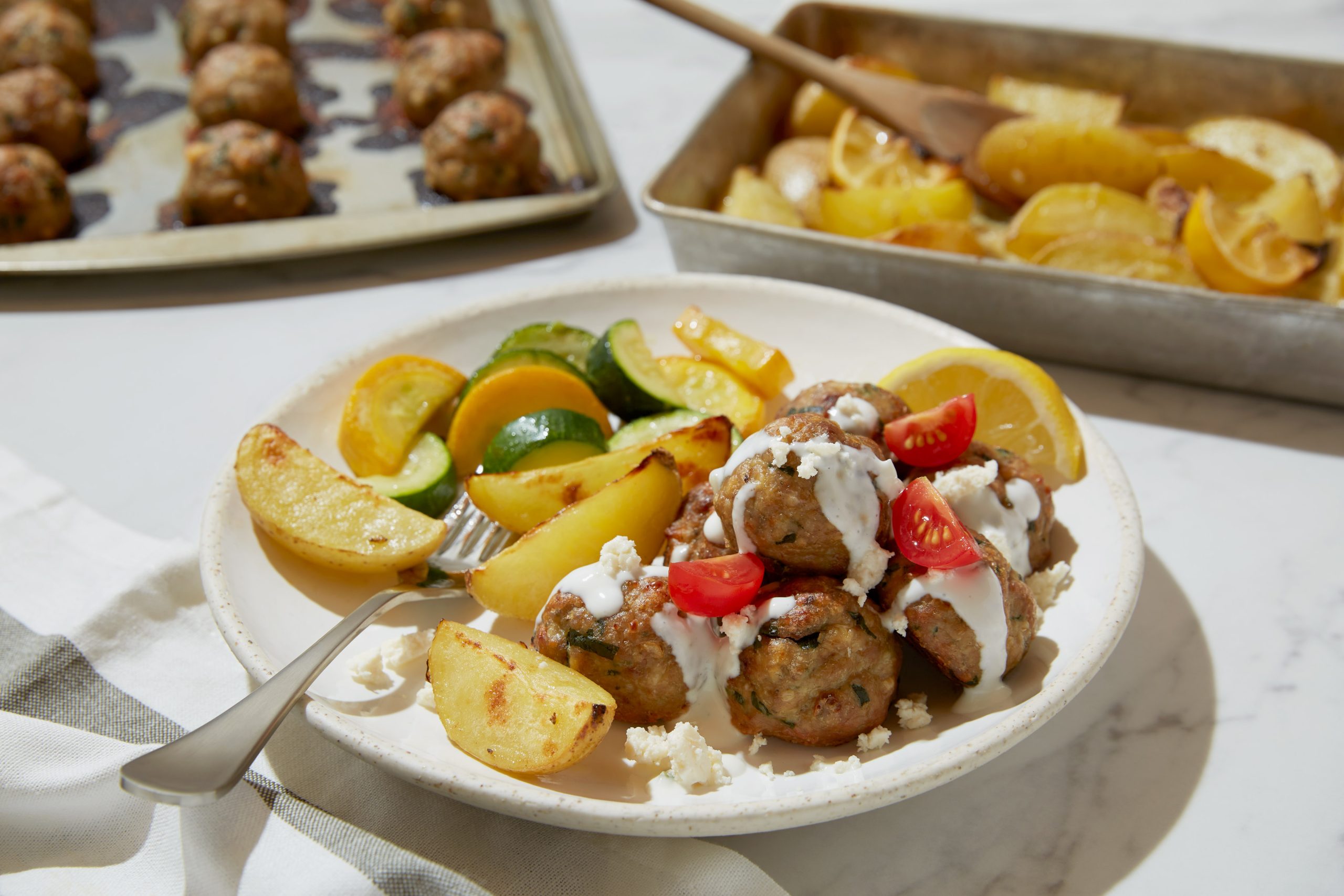 Greek Style Meatballs with Lemon Oregano Potatoes